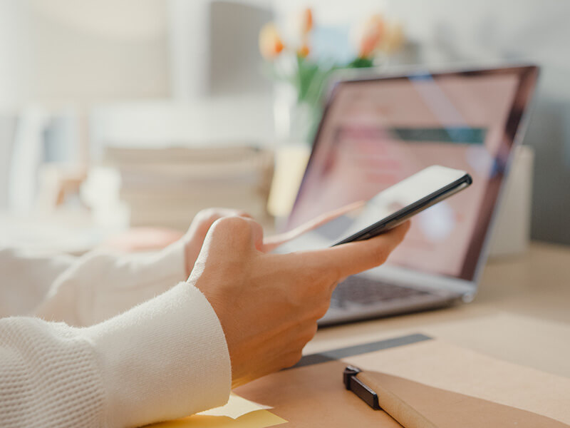 Woman focused on mobile phone chat