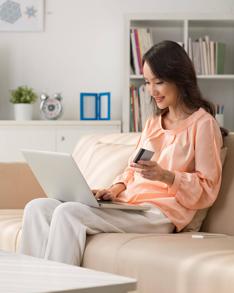 Woman paying on ecommerce platform